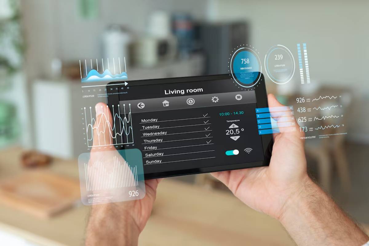 Person using a futuristic smart home device to monitor and control various household functions.